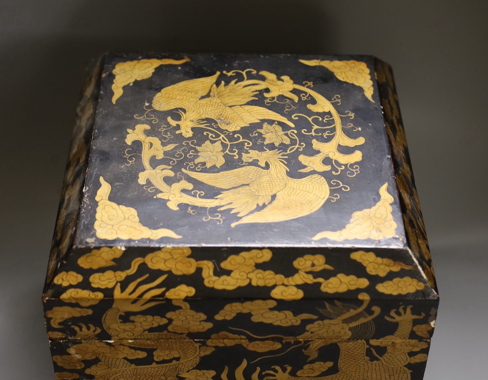 A Chinese black and gold lacquer ‘dragon’ box, early 20th century, 26.5 cms x 26.5 cms